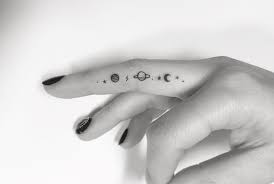 Finger tattoos are super cute! Space Finger Tattoo Finger Tattoo Designs Finger Tattoos Shape Tattoo