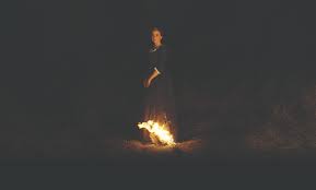 In the book, it is elena's daughter izzy (megan stott) speaking to the new york times, little fires everywhere showrunner liz tigelaar explained this change: Portrait Of A Lady On Fire Bonfire Song Explained Best Musical Moment Indiewire