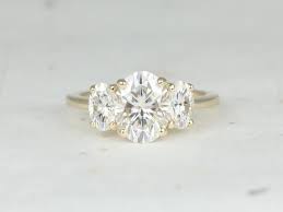 Enter your email id : Rosados Box Odessa 9x7mm 14kt Yellow Gold Oval F1 Moissanite Classic 3 Stone Engagement Ring