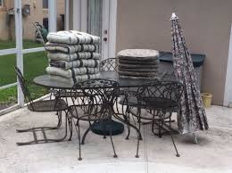 Vintage Lyon Shaw Wrought Iron Patio Table Chairs And Umbrella Wrought Iron Patio Table Patio Table Wrought Iron Patio Furniture