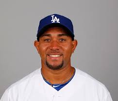 Dodgers release Miguel Olivo over ear-biting incident