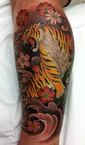 Japanese tiger tattoos have a particular art style that reflects the history of the great beast in ancient japanese culture. 45 Elegant Cherry Blossom Tattoo Designs Of 2020 Japanese Tattoo Blossom Tattoo Borneo Tattoo