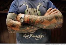 Armband tattoo trend for 2012. The Skull The Flame The Rod Don Ed Hardy And Von Dutch Girvin Strategic Branding Design