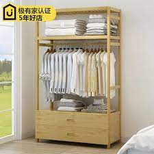 You can put the unit on your porch for solar drying, near back. Bedroom Clothes Shelf Floor Hangers Home Solid Wooden Bamboo Simple Wardrobe Modern Minimalist Rack