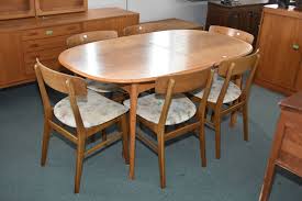 We stock teak dining tables, teak folding tables, teak coffee tables, rectangular tables, square tables, round tables. Mid Century Teak Dining Table With Large Jackknife Leaf And Six Chairs Made In Denmark By Farstrup