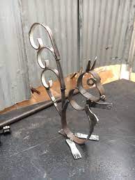 I Think U Could Do This With The Bourse Shoes Recycled Metal Art Metal Art Welded Metal Art Projects