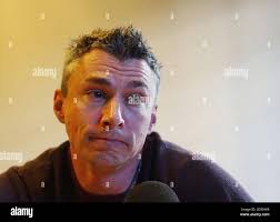 Great Britain's Jonathan Edwards announces his retirement from competition  at a press conference in Paris, Friday August 22, 2003. The 37-year-old  Olympic and world triple jump champion will retire after competing in