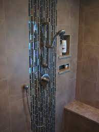 Of course they don't make your kitchen or bathroom physically bigger but it is more like an optical. Bathroom Shower Tile Shower Tile Bathroom Shower
