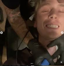 12 most fascinating rapper tattoos and the true stories. Machine Gun Kelly Reveals New Neck Tattoo