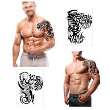 Here is another unique tattoo of a cross that seems to be inspired by the shield of the warrior. Buy Konsait Large Temporary Tattoos Half Arm Chest Tattoo Men Tribal Totem Tattoo Make Up Body Art Sticker For Halloween Party Supplies Beach Pool Party Favor Decor Dress Up Costume Accessories 8sheets Online