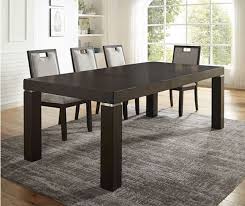 It?s the place where people come together to share meals and celebrations with family and friends. Sochi Dark Walnut Dining Table Decordells