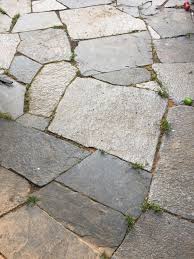 If you uncover a buried cable or pipe, encase it in sand. What To Fill Between Flagstones On Patio Previous Owner Installed This Patio But Just Left Dirt Between Each Stone I Don T Think The Spaces Are Big Enough To Grow Grass So Is