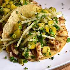 For the fish tacos first, cut fish into strips, roughly 1 inch wide and 4 inches long. Fish Tacos With Pineapple Jicama Slaw Clean Eating Jicama Slaw Clean Eating Recipes Recipes