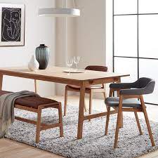 Wood chairs are versatile and match nearly any type of environment. Santino Dining Range The Furniture Co