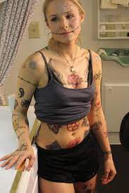 Kristen Bell covered in Fake Tattoos : rCelebrityBelly