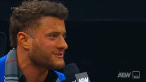 Jeff Jarrett comes down again for another promo. Of course, MJF interrupts.  Somehow, he gets going with his promo and when JJ tries to respond, MJF  screams not to interrupt. MJF says