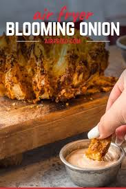 Continue cutting x patterns into the onion by turning the onion 90 degrees, then cut another x shape. Crispy Air Fryer Blooming Onion With Spicy Dipping Sauce Airfried Com