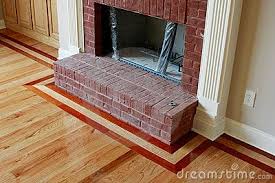 Three Row Wood Floor Border Around Brick Fireplace Wood Floors Wood Floor Installation Old Wood Floors