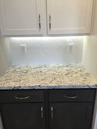 Kitchen Backsplash In A White 3x6 Subway Tile In A Vertical Herr White Subway Tiles Kitchen Backsplash Beveled Subway Tile Backsplash White Subway Tile Kitchen