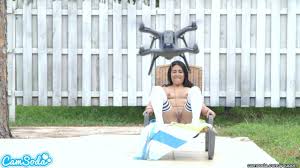 lesbian teen threesome play tug a war with a drone pulling ping balls out  of their college pussies