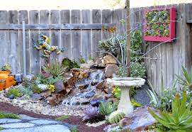 Secret Succulent Garden This Small Space Garden Includes Pond Less Waterfall Seating Areas Fl Small Space Gardening Succulents Garden Vegetable Beds Raised