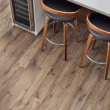 The rustic style is enhanced by subtle character marks of knots, cracks and splits that look just like true hardwood flooring. Pergo Outlast 6 14 In W Linton Auburn Oak Waterproof Laminate Wood Flooring 967 2 Sq Ft Pallet Lf000984p The Home Depot Wood Laminate Oak Laminate Flooring Flooring