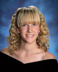 Doddridge County High School graduates cross stage May 21