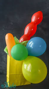 I cant find any tissue paper in the house to put in a gift bag for my bestfriend's birthday which is tomorrow. Insanely Easy Balloon Gift Wrapping Tutorial Balloon Gift Decorated Gift Bags Gift Wrapping