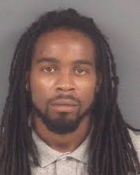 Man accused of hiding gun used in slaying