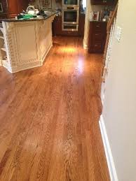 Above is the oak floors after they received an application of the white wash stain (called country white wash from dura above is another shot of the red oak floors right before they started the refinishing process. Red Oak With Early American Stain And Uv Finish Kashian Bros Carpet And Flooring Red Oak Floors Oak Floor Stains Flooring