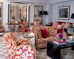 Even if you think a dining room is a great place to experiment with color, that doesn't mean you have to pick a bold wall color; Hearst Magazines Red Couch Living Room Eclectic Living Room Gold Living Room