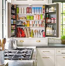 You could do this with one shelf too! 22 Brilliant Ideas For Organizing Kitchen Cabinets Better Homes Gardens