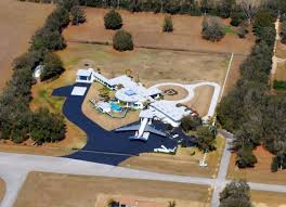 John travolta owns an impressive home in anthony, florida. Florida Memory Aerial View Overlooking The Home Of John Travolta And Kelly Preston In The Jumbolair Aviation Estates Gated Community In Ocala Florida