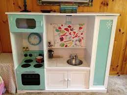 About 6 or so months ago i was floating through 'blog land' as i do from time to time and somehow i stumbled upon sutton grace blog, where a particular blog post jumped out at me: Tv Stand Turned Into Play Kitchen Diy Play Kitchen Play Kitchen Diy Kids Kitchen