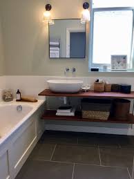 This bathroom vanity was hand crafted using reclaimed oak barn boards. Bathroom With Reclaimed Iroko Worktops From Old Science Labs Bathroom Corner Bathtub Bathtub