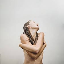 Young Naked Woman In The Rain