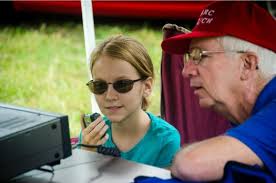 What is an amateur (HAM) radio license, and what is involved in obtaining  one?