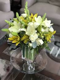 Winter wedding flowers floral wedding wedding blue dress wedding november wedding flowers silver truly succulent wedding bouquets. White Lily White Roses Yellow Lily Bells Of Ireland By Rosemantico Flowers