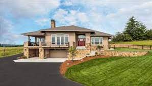 Drive under house plans are designed for garage placement located under the first floor plan of the home. Drive Under House Plans Garage Underneath Garage Under House Plans