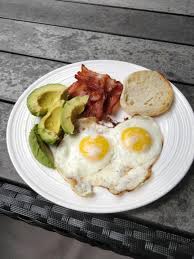 Homemade Fried Eggs Toasted Crumpet Bacon And Avocado For Breakfast Food Recipes Food Avocado Breakfast Fried Egg