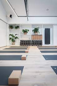 A Relaxing Yoga Pose Informed The Serene Aesthetic Of This Exercise Studio In Dublin Ireland Created By L Yoga Studio Design Yoga Studio Decor Home Yoga Room
