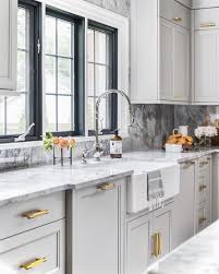 You can choose light or dark countertops to go with gray cabinets, says steinbach. Light Grey Kitchen Cabinets With Marble Countertops Novocom Top