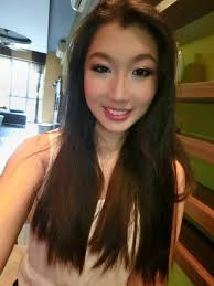 Elsa Yan Make Up Artist added a...