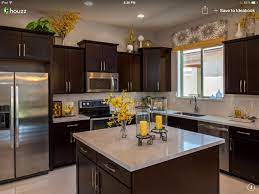 How To Decorate The Top Of Kitchen Cabinets Home Design Lover Kitchen Cabinets Decor Top Kitchen Cabinets Kitchen Remodel