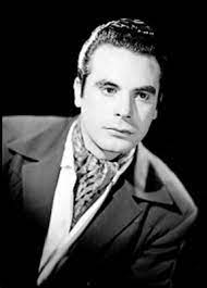 Fernando Casanova, actor, viste de saco y camisa con una mascada en el  cuello, retrato | Mediateca INAH