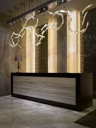 The Wyndham Hotel In Exciting Istanbul Features Luxuriously Appointed Individually Styled R Office Interior Design Hotel Interior Design Hotel Lobby Reception