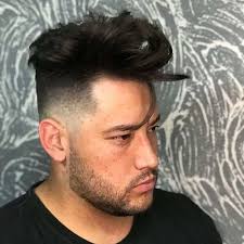 The sides are slicked back but the long hair on top gets plenty of volume and texture to create some real juxtaposition. 11 Best Low Fade Haircuts For Long Hair Cool Men S Hair
