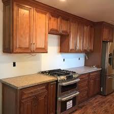 If you're short on kitchen cabinet space, consider taking some items out of your cabinets and storing them elsewhere don't relegate your snazzy coffee or espresso machine to the back of the cupboard. Coffee Glaze Wall Microwave Cabinet Solid Wood Soft Close Rta Cabinetry
