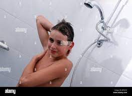 Teenager showering hi-res stock photography and images - Alamy