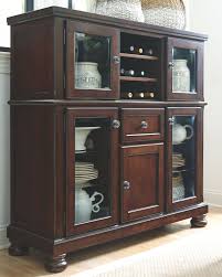 Baker's racks can add a bit of modern edge to a small dining room, although some models can fit in nicely with classic furniture. Porter Dining Server Ashley Furniture Homestore Dining Room Server Dining Room Storage Dining Server